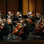 Orchestra performing on stage